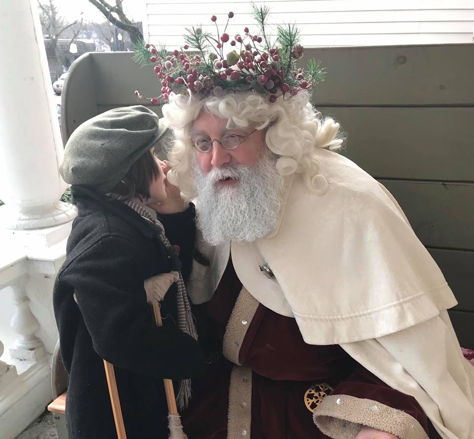 Tiny Tim speaking with Father Christmas